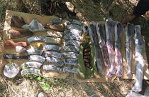 Five automatic rifles, a machine gun and five grenade launchers were among the weapns recovered by authorities.