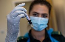 paramedic, holds a blood sample during an antibody testing program at the Hollymore Ambulance Hub, in Birmingham, England, on Friday, June 5, 2020.