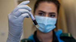 paramedic, holds a blood sample during an antibody testing program at the Hollymore Ambulance Hub, in Birmingham, England, on Friday, June 5, 2020.