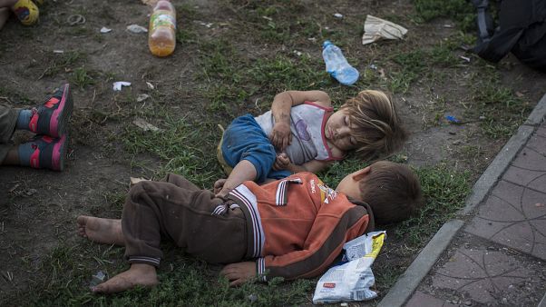 Syrian children sleep in a park in Belgrade, Serbia Syrian children sleep in a park in Belgrade, Serbia