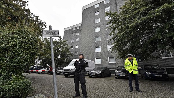Police secure the entrance of a house where five dead children were found in Solingen, Germany Police secure the entrance of a house where five dead children were found in Solingen, Germany