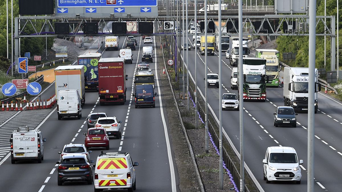 In this file photo dated Monday, May 18, 2020, traffic moves along the M6 motorway near Birmingham, England. 