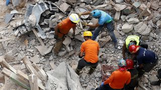 Rescuers search the site of a collapsed building after signals indicated there may be a survivor under the rubble, Beirut, Lebanon. Sept. 4, 2020.
