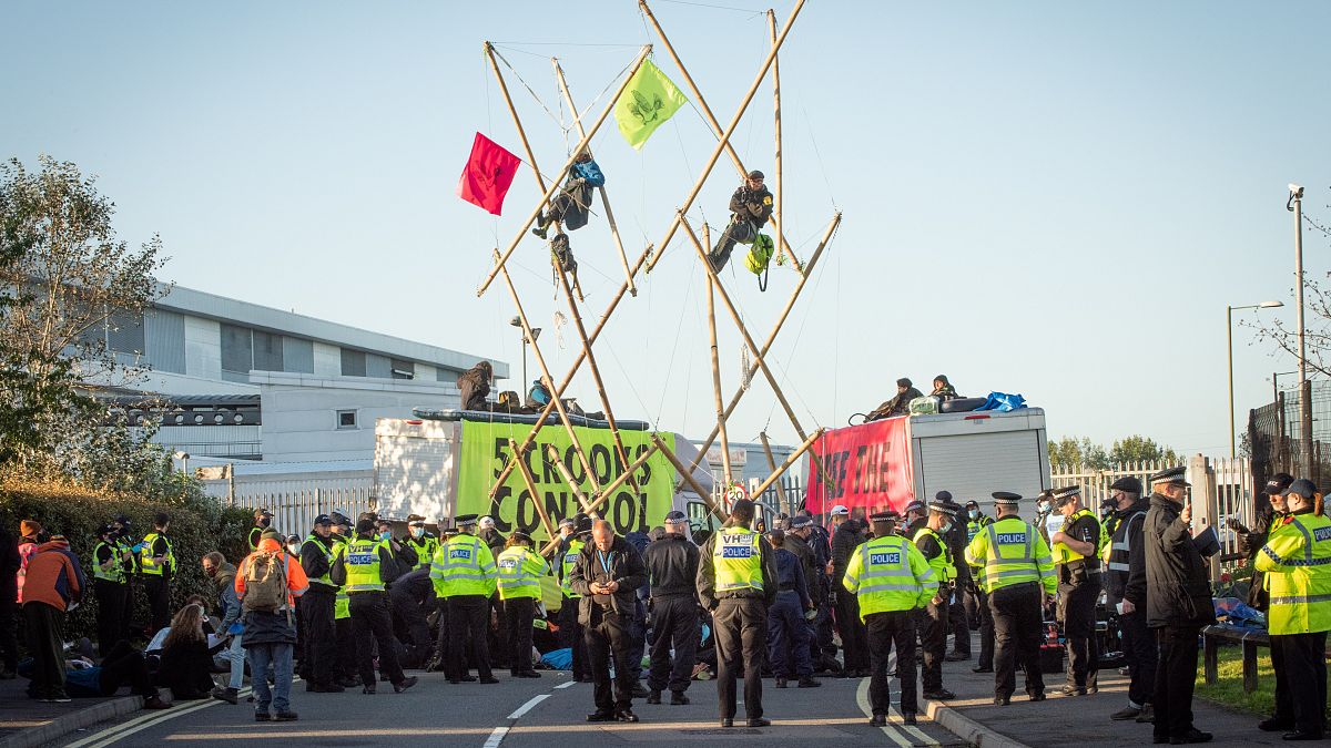 Extinction Rebellion activists create a structure to blockade Newsprinters plant, UK. Septemeber 5, 2020.