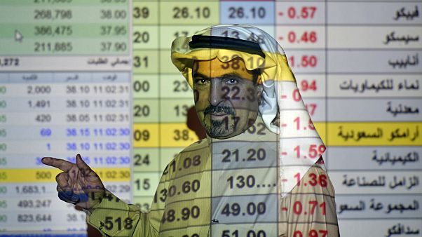 A trader at the Arab National Bank in Riyadh, Saudi Arabia A trader at the Arab National Bank in Riyadh, Saudi Arabia