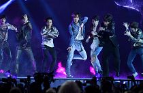 BTS performs "Fake Love" , “Dynamite” was the group’s first all-English song