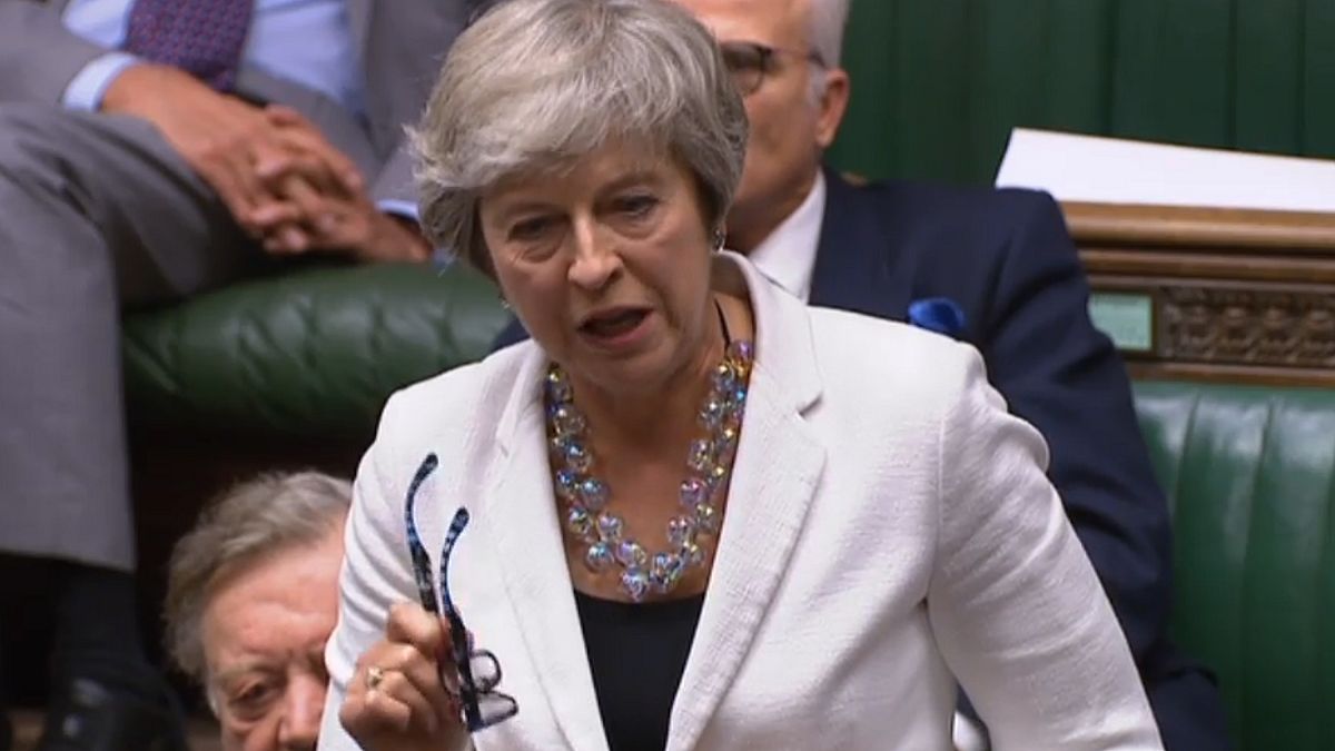 Footage broadcast by the UK Parliament's Parliamentary Recording Unit (PRU) shows former prime minister Theresa May in the House of Commons in London on October 19, 2019.