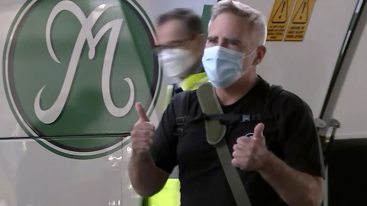 In this image made from a video, The Australian Financial Review journalist Michael Smith on his arrival at Sydney airport, Australia Tuesday, Sept. 8, 2020.