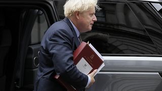 Britain's Prime Minister Boris Johnson returns to Downing Street after attending the weekly session of Prime Ministers Questions in Parliament in London. Sept. 9, 2020.