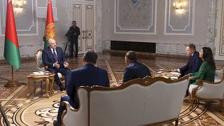 Belarusian President Alexander Lukashenko, left, speaks during his interview with Russian journalists in Minsk, Belarus, Sept. 8, 2020. (Nikolai Petrov, BelTA via AP)