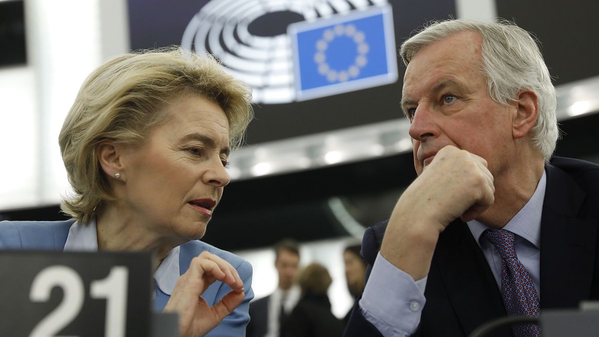 European Commission President Ursula von der Leyen, left, talks to to European Union chief Brexit negotiator Michel Barnier