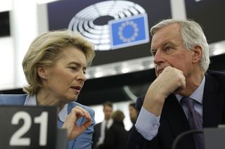 European Commission President Ursula von der Leyen, left, talks to to European Union chief Brexit negotiator Michel Barnier