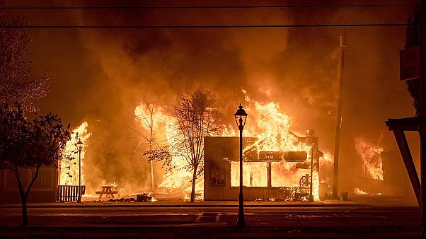 Buildings are engulfed in flames as a wildfire ravages the Oregon town of Talent on September 8, 2020. Buildings are engulfed in flames as a wildfire ravages the Oregon town of Talent on September 8, 2020.