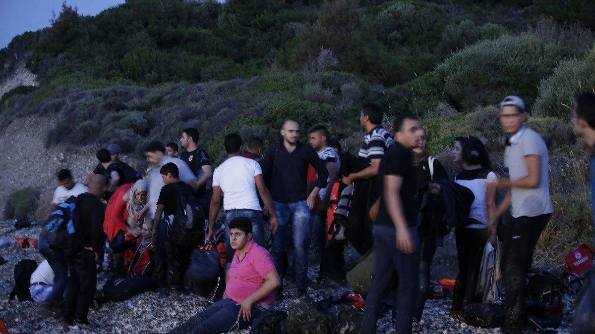 FILE: Syrian migrants arrive from Turkish coasts at a beach in Mytilene, on the northeastern Greek island of Lesvos, June 16, 2015. 