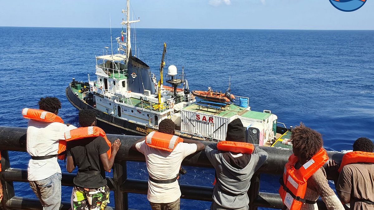 Migrants on the Danish-flagged tanker Maersk Etienne wait to be transferred on the Mediterranea NGO's Mare Jonio rescue ship, in the Mediterranean Sea, Sept 11, 2020. 