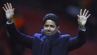File photo: Nasser Al-Khelaifi waves to the crowd after a PSG match against Manchester United at Old Trafford stadium in Manchester, UK. Feb. 12, 2019.