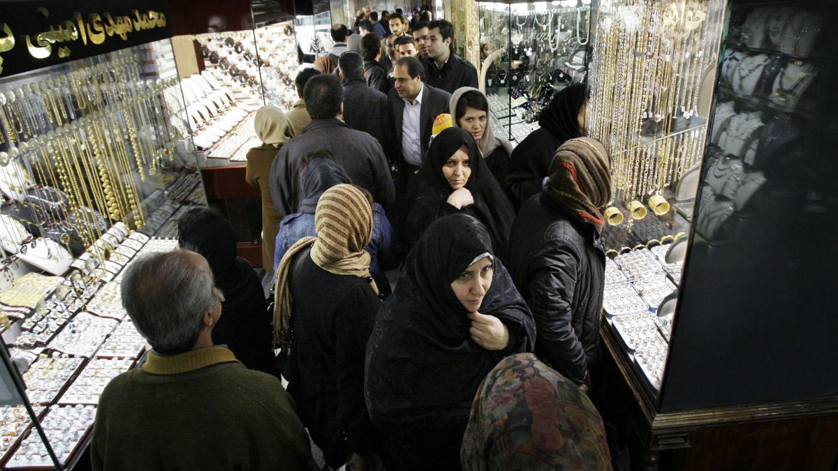 Iranians walk at the gold market of Tehran's old main bazaar, Iran