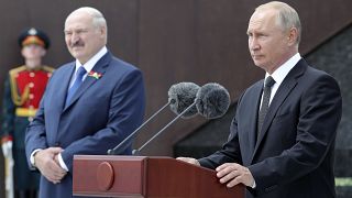 Russian President Vladimir Putin, right, and Belarusian President Alexander Lukashenko at public ceremony, in the village of Khoroshevo, Russia, 30, 2020