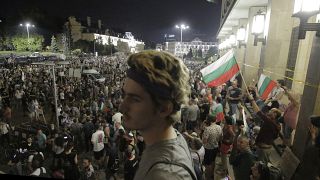 Hundreds of demonstrators gather to protest against the government in front of the new National Assembly building, demanding government resignation in Sofia, Bulgaria