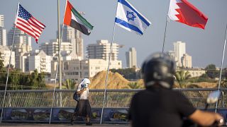 American, United Arab Emirates, Israel and Bahraini flags fly at the Peace Bridge in Netanya, Israel, Monday, Sept. 14, 2020. 