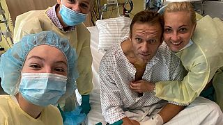 Alexei Navalny posts a photo of himself in a Berlin hospital following his suspected poisoning.