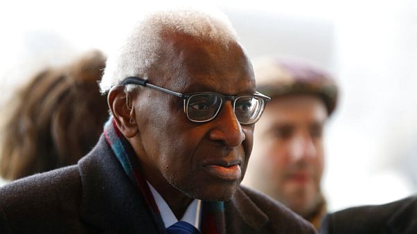 Iin this Jan.13, 2020 file photo, former president of the IAAF (International Association of Athletics Federations) Lamine Diack arrives at the Paris courthouse, Monday, Jan. Iin this Jan.13, 2020 file photo, former president of the IAAF (International Association of Athletics Federations) Lamine Diack arrives at the Paris courthouse, Monday, Jan.