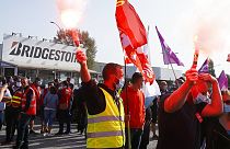 Bridgestone employees gather outside the tire factory of Bethune, northern France, Thursday, Sept.17, 2020
