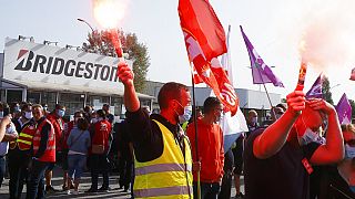 Bridgestone employees gather outside the tire factory of Bethune, northern France, Thursday, Sept.17, 2020
