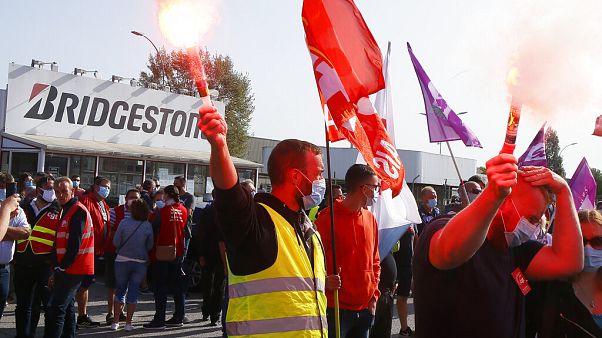 Bridgestone employees gather outside the tire factory of Bethune, northern France, Thursday, Sept.17, 2020 Bridgestone employees gather outside the tire factory of Bethune, northern France, Thursday, Sept.17, 2020