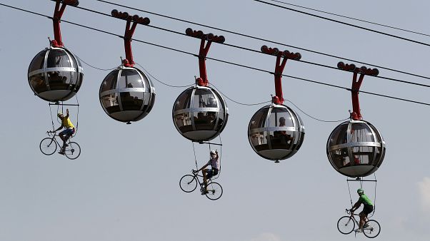 Performers dressed as riders pedal during the start of stage 17 of the Tour de France cycling race over 170 kilometres, starting in Grenoble. September 16, 2020 Performers dressed as riders pedal during the start of stage 17 of the Tour de France cycling race over 170 kilometres, starting in Grenoble. September 16, 2020