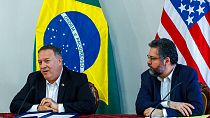 U.S. Secretary of State Mike Pompeo speaks as Brazilian Foreign Minister Ernesto Araujo looks on during a press conference at the Boa Vista Air Base in Roraima, Brazil