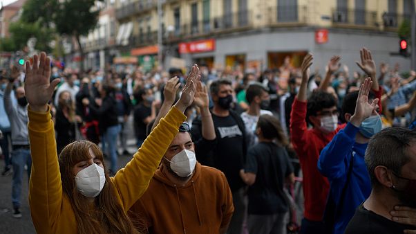 People attend a demonstration at the Vallecas neighborhood in Madrid, on September 20, 2020, to protest against the new restrictive measures. People attend a demonstration at the Vallecas neighborhood in Madrid, on September 20, 2020, to protest against the new restrictive measures.