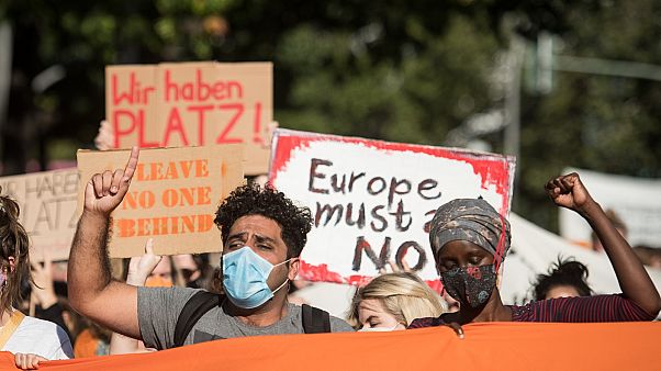 Protesters demonstrate for the evacuation of all migrant camps in Greece after the fire at the Moria refugee camp on Lesbos, on September 20, 2020, in Berlin. Protesters demonstrate for the evacuation of all migrant camps in Greece after the fire at the Moria refugee camp on Lesbos, on September 20, 2020, in Berlin.