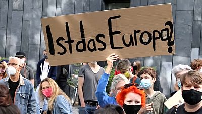 Демонстранты в Берлине требуют принять большее число мигрантов из Греции
