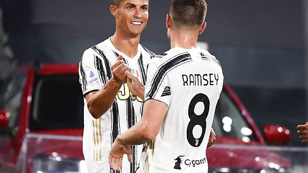 Juventus' Cristiano Ronaldo, left, celebrates his goal with teammate Aaron Ramsey during an Italian Serie A match between Juventus and Sampdoria at the Allianz Arena Juventus' Cristiano Ronaldo, left, celebrates his goal with teammate Aaron Ramsey during an Italian Serie A match between Juventus and Sampdoria at the Allianz Arena