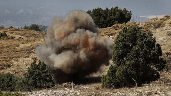 خلال عملية تفجير ألغام في لبنان خلال عملية تفجير ألغام في لبنان
