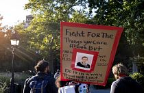 In this Sept. 19, 2020, file photo, a sign featuring a likeness of Justice Ruth Bader Ginsburg is carried in New York, a day after the death of the Supreme Court justice.