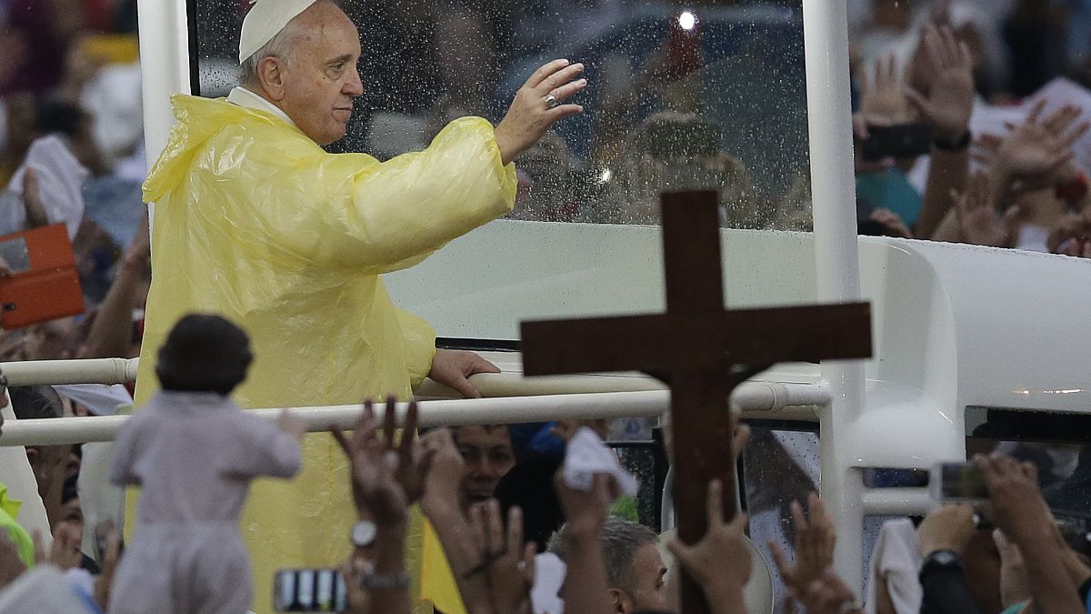 FILE: Pope Francis waves to the faithful after celebrated his final Mass in Manila, Philippines, Jan. 18, 2015.