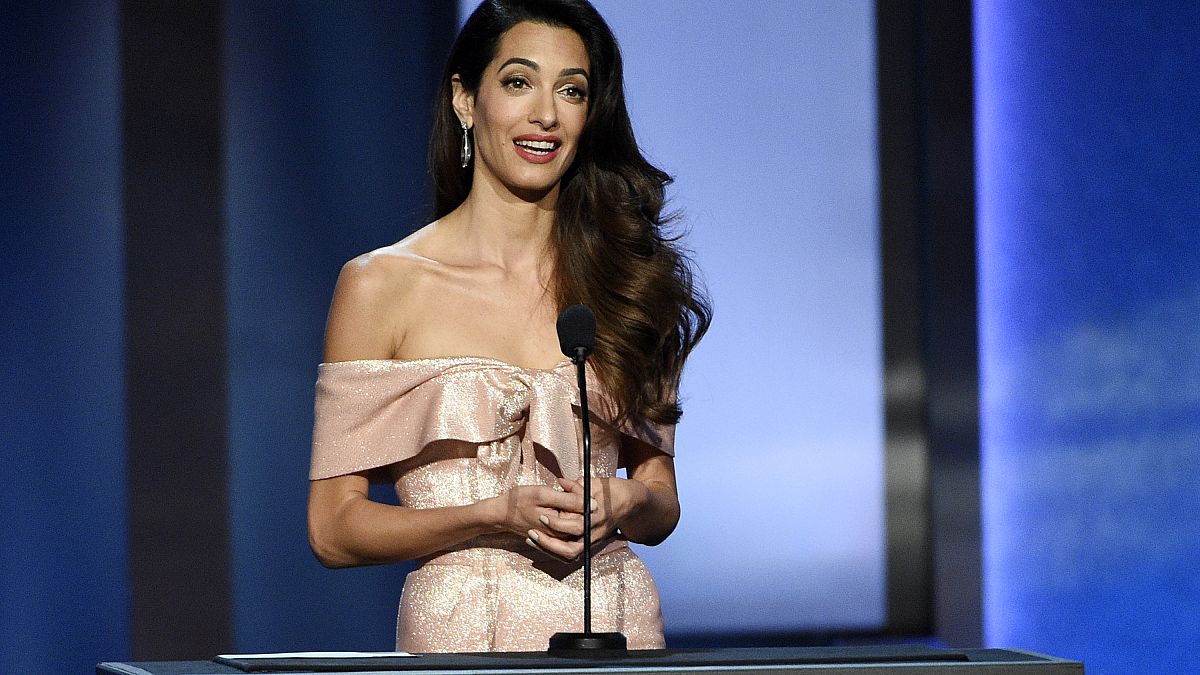 FILE: Amal Clooney at the Dolby Theatre, June 7, 2018, in Los Angeles. 
