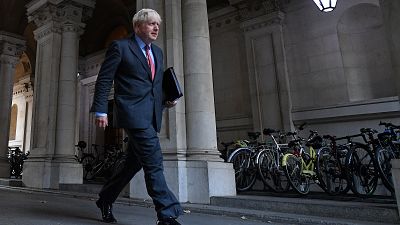 UK Prime Minister Boris Johnson walks to Downing Street in London on September 22, 2020 after attending the weekly cabinet meeting at the Foreign Office.