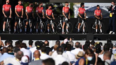 amsic riders attend the teams' presentation two days before the start of the 1st stage of the 107th edition of the Tour de France