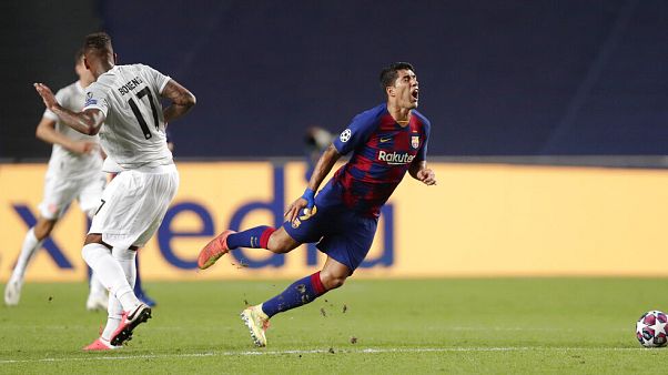 Barca striker Luis Suarez on his way to the turf in game between FC Barcelona and Bayern Munich at the Luz stadium in Lisbon, Portugal, Friday, Aug. 14, 2020 Barca striker Luis Suarez on his way to the turf in game between FC Barcelona and Bayern Munich at the Luz stadium in Lisbon, Portugal, Friday, Aug. 14, 2020