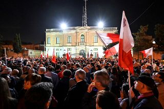 People gather for a protest called by the family of killed journalist Daphne Caruana Galizia and civic movements on December 3, 2019 outside the police HQ in Valletta.