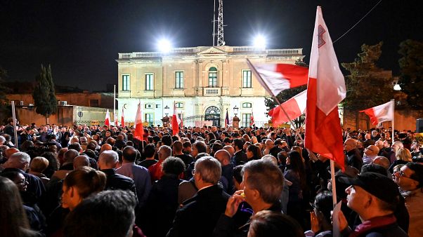 People gather for a protest called by the family of killed journalist Daphne Caruana Galizia and civic movements on December 3, 2019 outside the police HQ in Valletta. People gather for a protest called by the family of killed journalist Daphne Caruana Galizia and civic movements on December 3, 2019 outside the police HQ in Valletta.