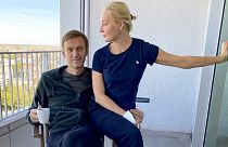 Russian opposition leader Alexei Navalny and his wife Yulia pose for a photo in a hospital in Berlin.