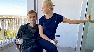 Russian opposition leader Alexei Navalny and his wife Yulia pose for a photo in a hospital in Berlin.