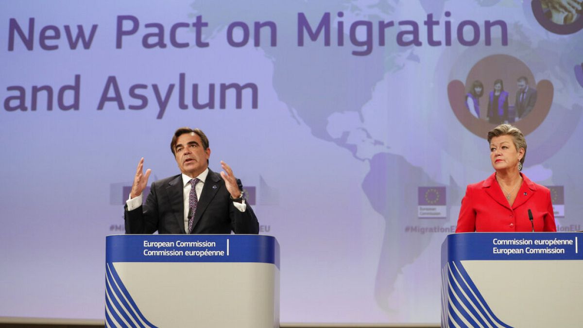 Margaritas Schinas, left, and European Commissioner for Home Affairs Ylva Johansson present the EU's New Pact on Migration and Asylum