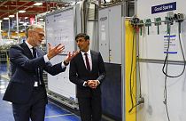 Rishi Sunak talks with the CEO of Worcester Bosch, Carl Arntzen, left, during a visit to Worcester Bosch factory to promote the initiative, Plan for Jobs