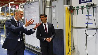 Rishi Sunak talks with the CEO of Worcester Bosch, Carl Arntzen, left, during a visit to Worcester Bosch factory to promote the initiative, Plan for Jobs