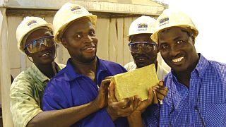The first gold ingot poured at the Loulo Mine in Mali is displayed